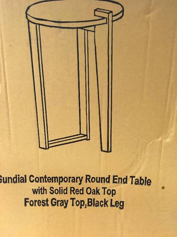 lot 27 image: Sundial Contemporary Round End Table by American Trails in good condition