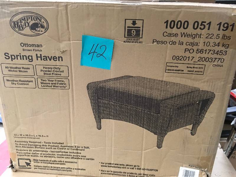 lot 42 image: Hampton Bay Spring Haven Brown All-Weather Wicker Outdoor Patio Ottoman with Sky Blue Cushion in good condition