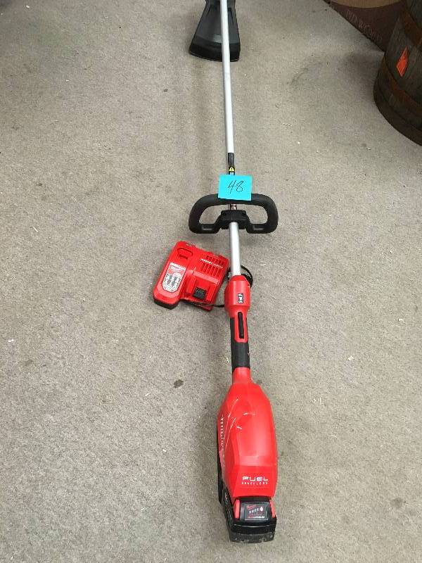 lot 48 image: Milwaukee M18 FUEL 18-Volt Lithium-Ion Brushless Cordless String Trimmer Kit with  Battery and Rapid Charger in good condition