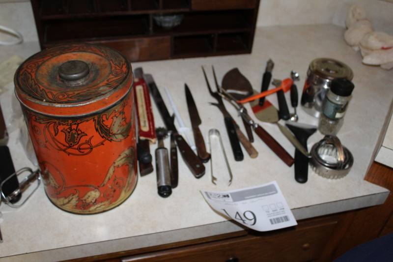 lot 149 image: Kitchen Utensils, Carving Knives, Serving Fork, Pie Spatula, Metal Tin, Ice Tongs, And More