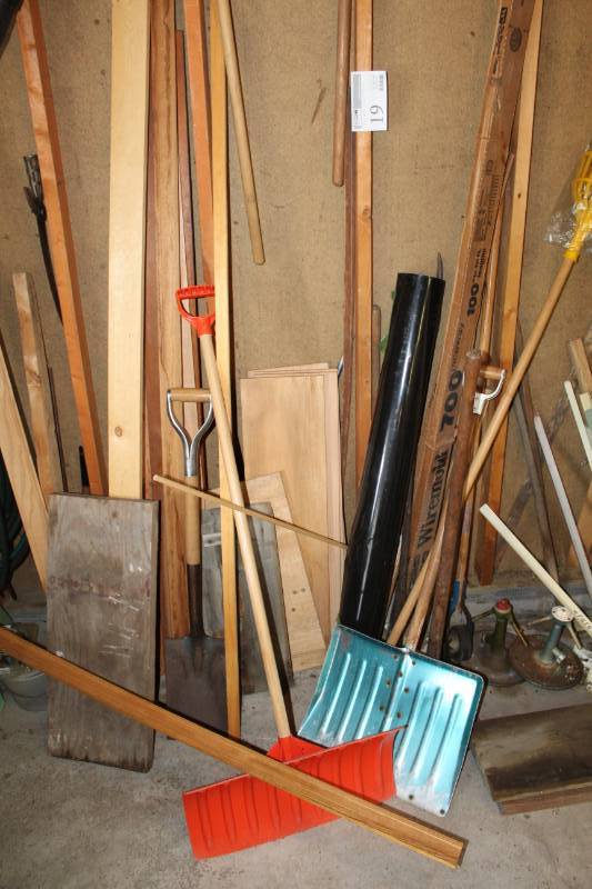 lot 19 image: Misc. Wood Boards, Yard Tools, Toro Leaf Blower, Snow Shovels, Shovels, Pick, Large Metal Hook