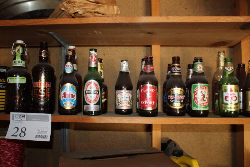 lot 28 image: Old Beer Bottles - Becks, Bitter Fischer dAlsace, Fullers ESB, Alpine Lager, Oland, Ten-Penny, Alexander Keiths India Pale Ale, Labatts 50, And More