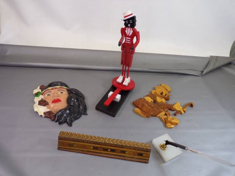 lot 66 image: Black American Toy, Adv. Pen stand. And Wall dcor