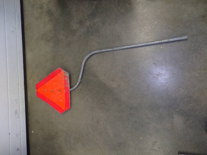 lot 112 image: Slow Moving Vehicle sign with bracket