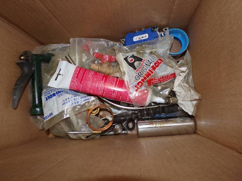 lot 214 image: Box of Plumbing Supplies