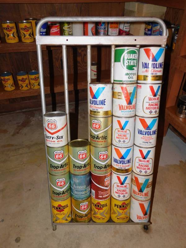 lot 3 image: Vintage Unopened Cans Of Motor Oil and Stand