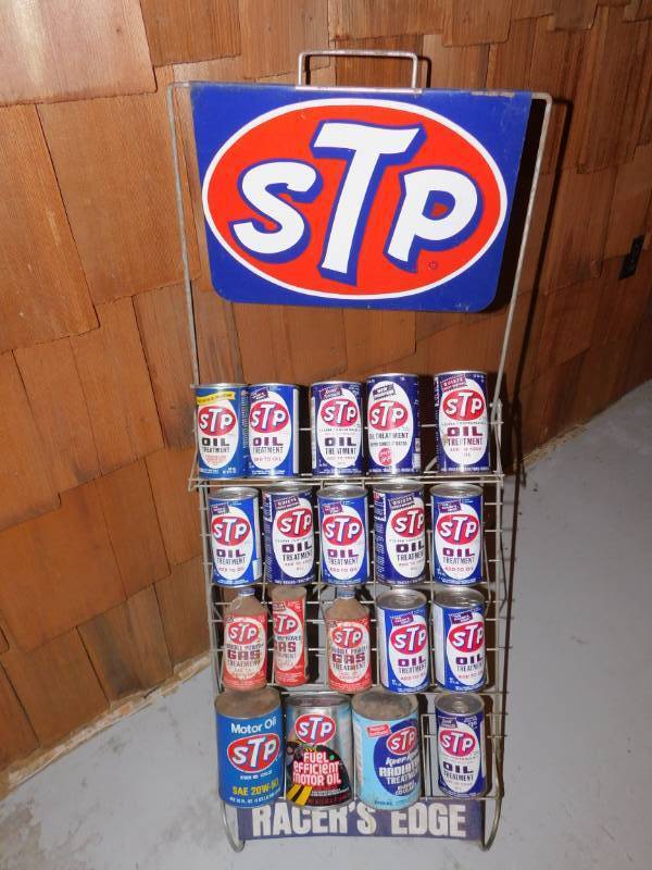 lot 4 image: Vintage Unopened Cans of STP and Stand