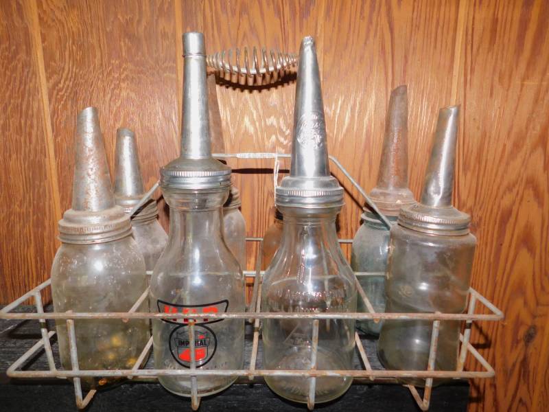 lot 9 image: Lot of Antique Vintage Embossed Glass 1 QT Motor Oil Bottles With Spouts and Carrier
