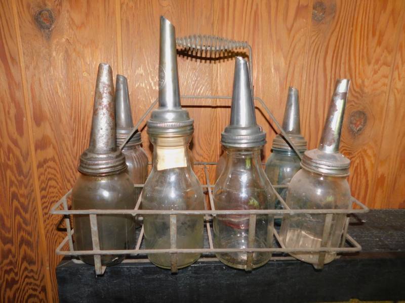 lot 10 image: Lot of Antique Vintage Embossed Glass 1 QT Motor Oil Bottles With Spouts and Carrier
