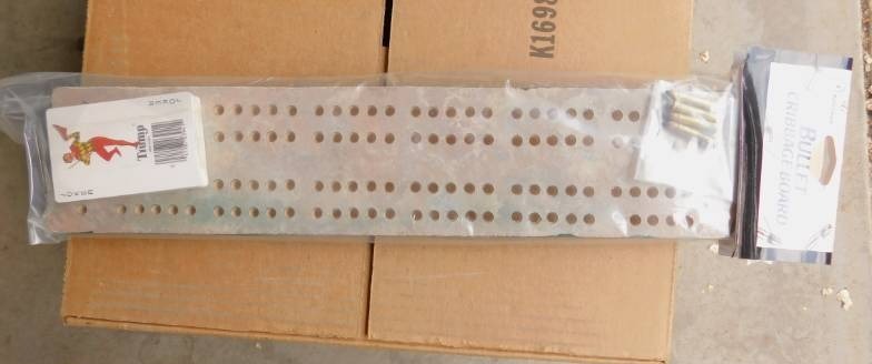 lot 38 image: New Bullet Cribbage Board