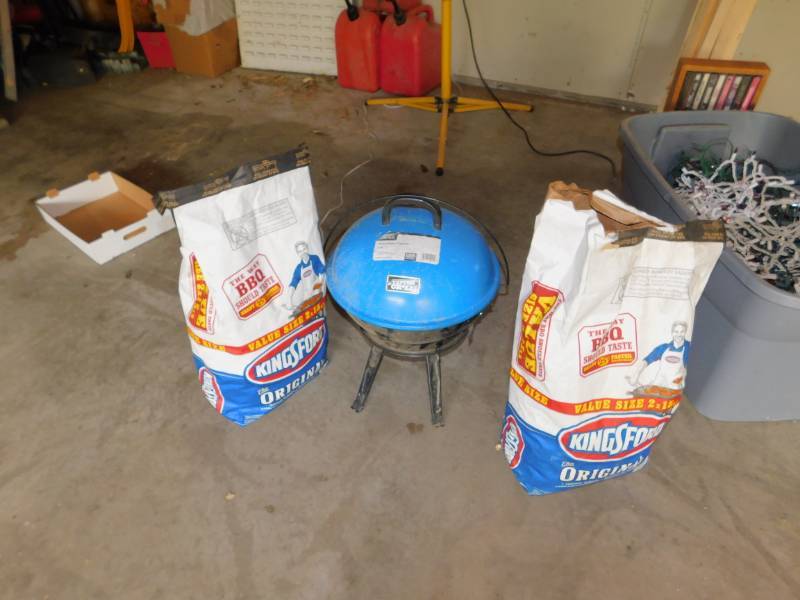 lot 43 image: Small Weber Grill with 1 12 Bags of Charcoal