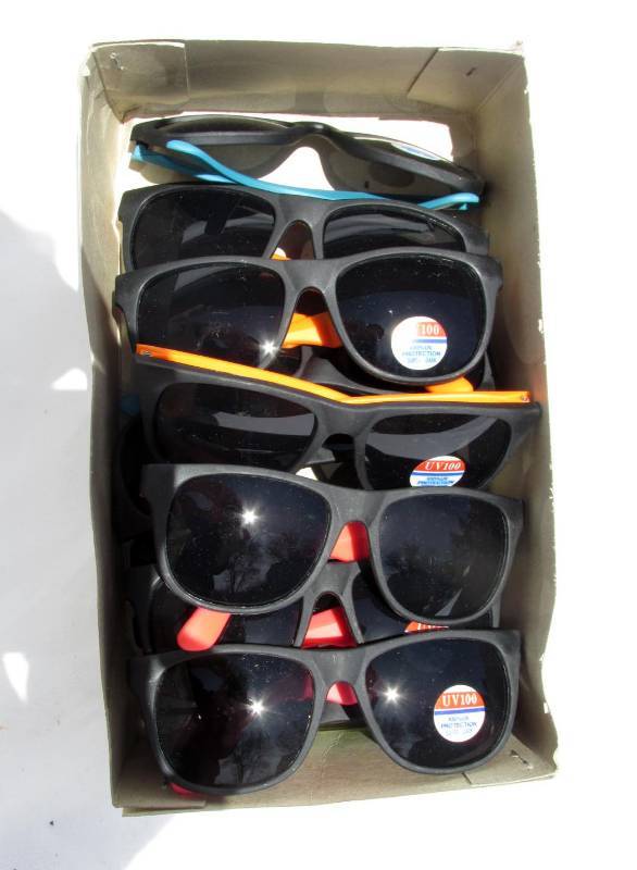 lot 24 image: Huge Case of New Vintage 1990s Special Export Light Beer Sunglasses