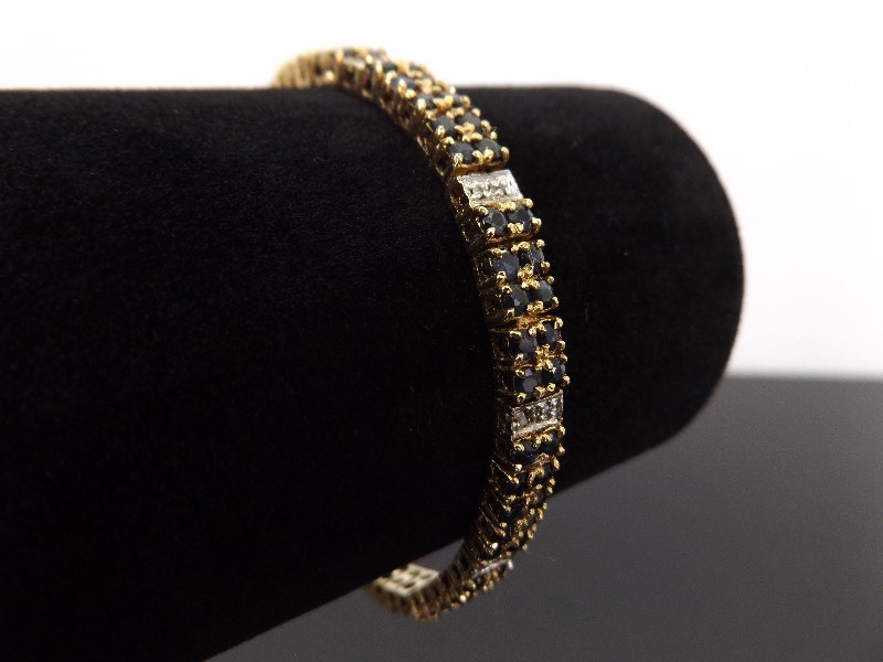 lot 32 image: .925 Sterling Silver Sapphire Diamond Accented Vermeil Tennis Bracelet