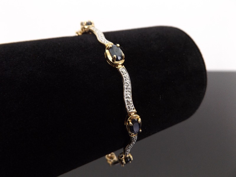 lot 33 image: .925 Sterling Silver Faceted Sapphire Vermeil Tennis Bracelet