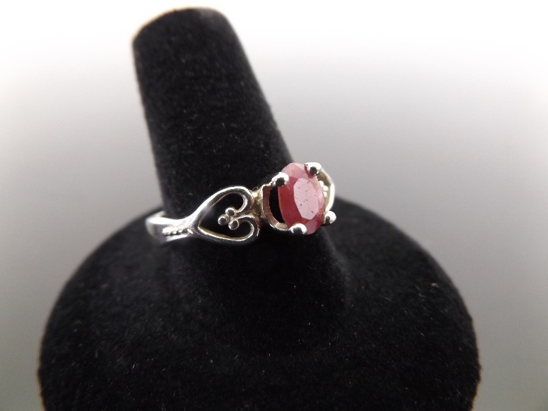 lot 62 image: .925 Sterling Silver Faceted Ruby Ring Size 10