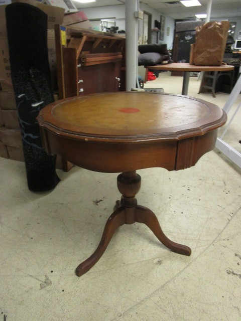 lot 945 image: ROUND WOOD TABLE WITH DRAWER