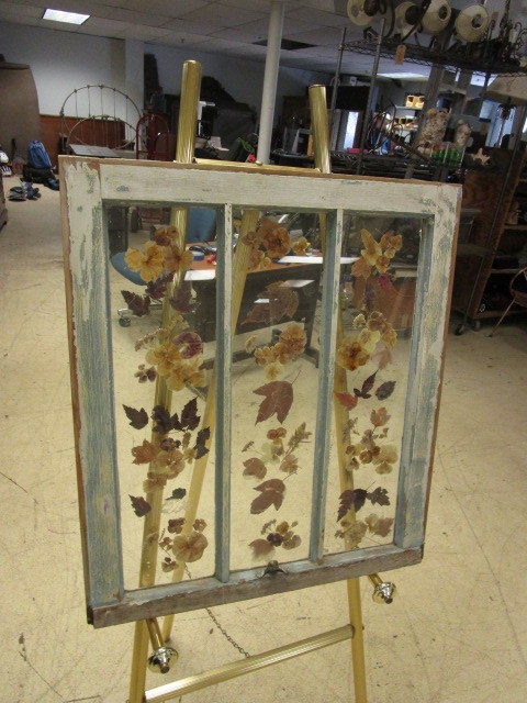 lot 953 image: DRY PRESSED LEAVES ON A RUSTIC WINDOW