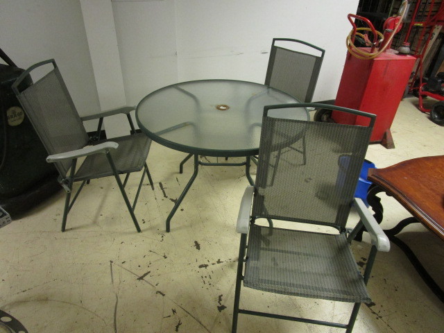 lot 109 image: GLASS TOP PATIO TABLE WITH THREE FOLDING CHAIRS