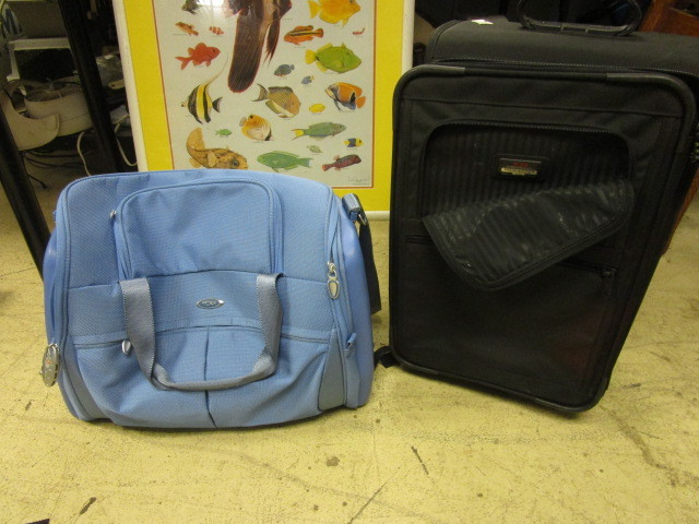 lot 132 image: TWO TUMI BAGS