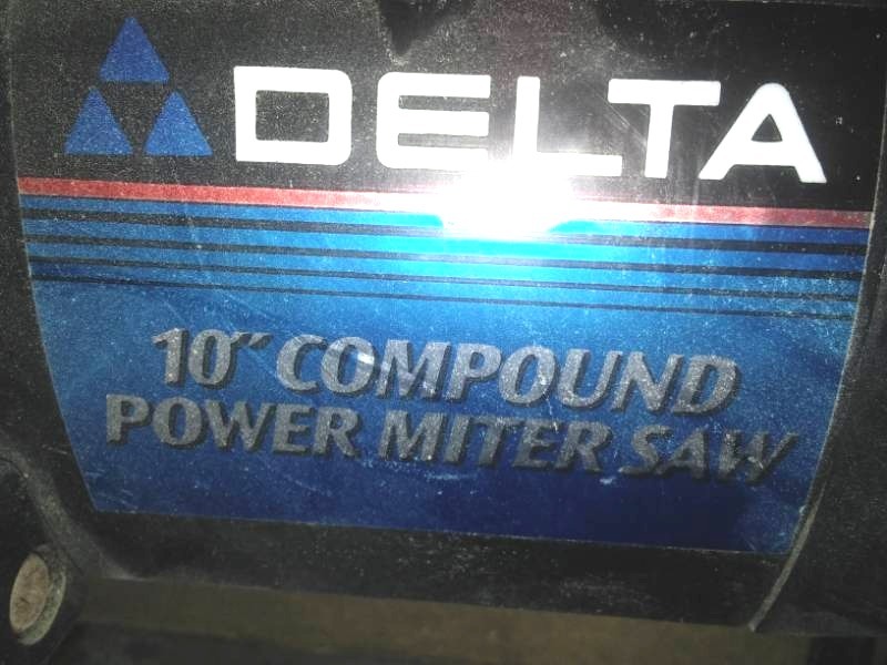 lot 242 image: Delta 10 inch compound miter saw, new brushes
