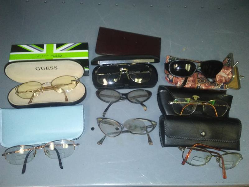 lot 323 image: Eyeglasses glasses with cases.