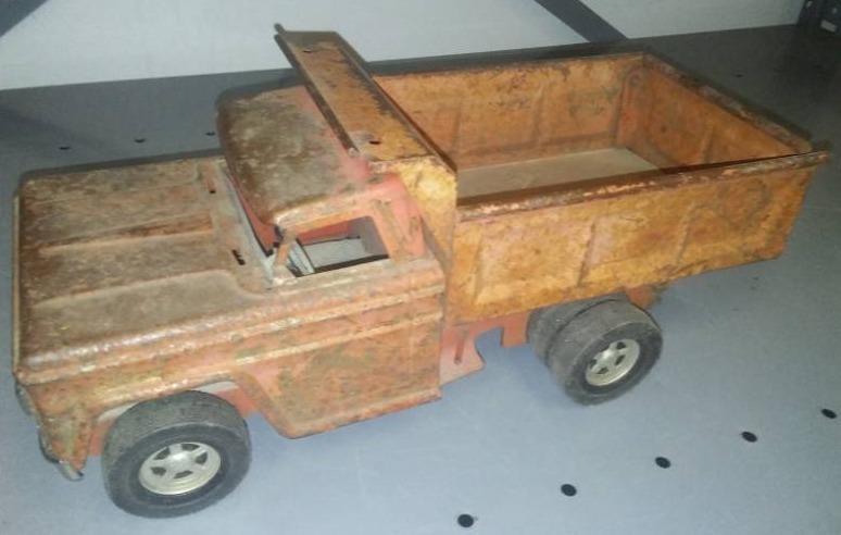 lot 379 image: Vintage Metal Toy Dump Truck,