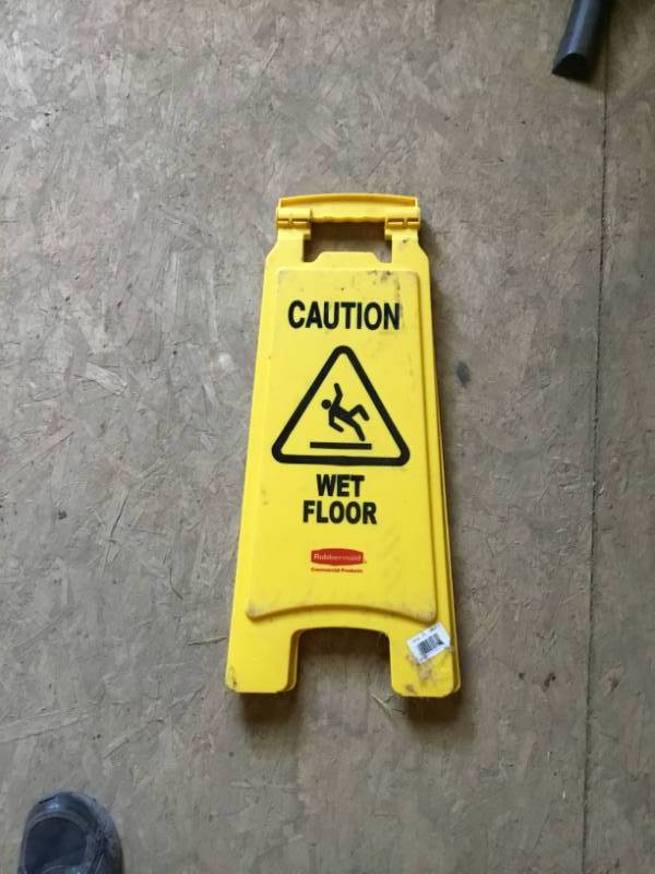 lot 60 image: V style Caution wet floor sign