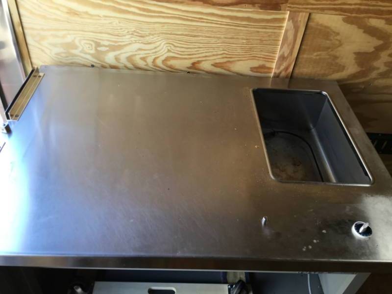 lot 138 image: Stainless Steel table with heat well.
