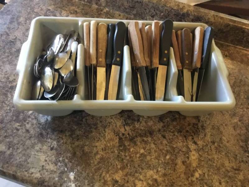 lot 194 image: 3 silverware bins one full of knives, spoons and forks.