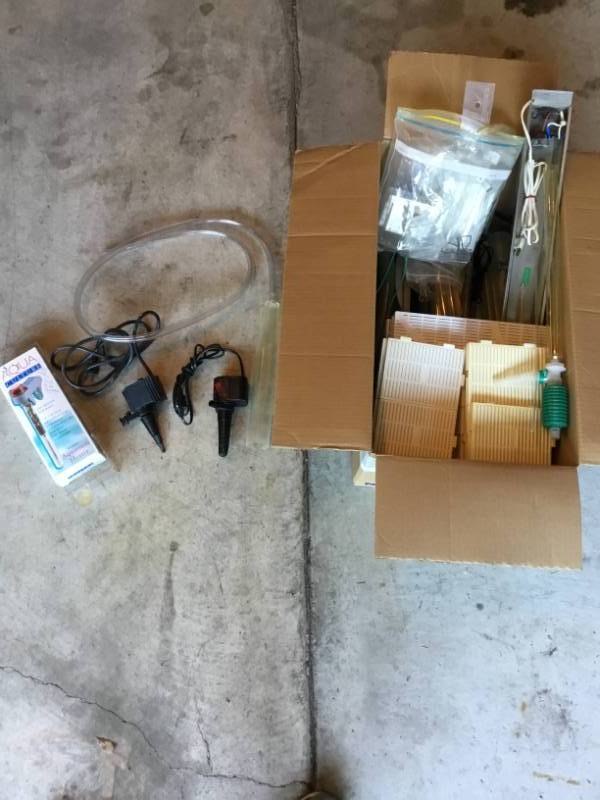 lot 27 image: Fish tank items large box full.