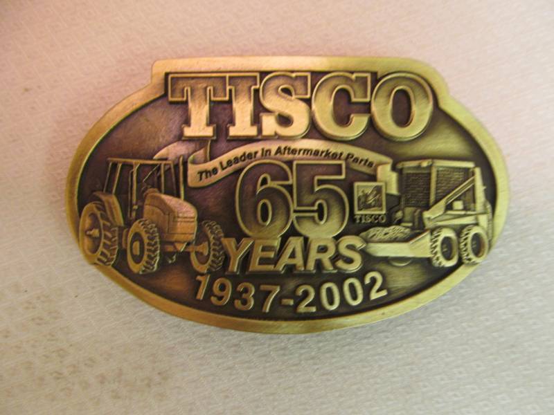 lot 14 image: Tisco 65 Years Limited Edition Belt Buckle