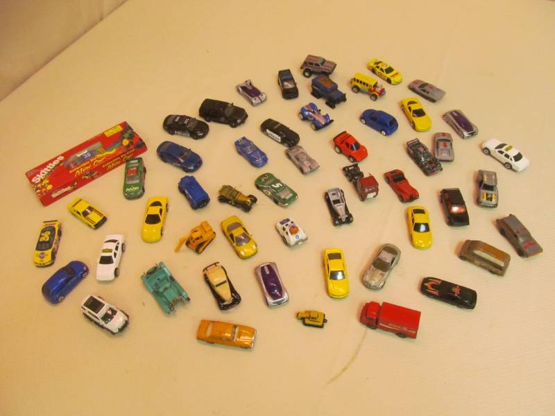lot 117 image: Approx. 50 Matchbox Size Cars- Some VintageMetal, NIP Skittles 1997, Hot wheels, Maestro, and others
