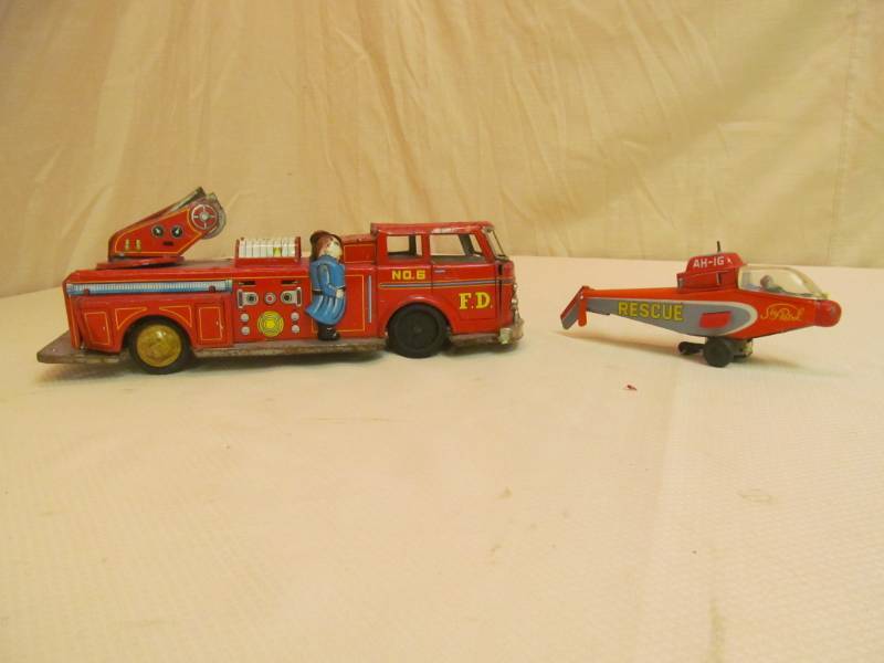 lot 118 image: Vintage Tin Toys, Helicopter, Firetruck