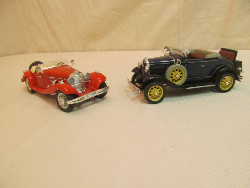 lot 127 image: Metal 124 Cars, 1936 Mercedes Benz 500, 1931 Ford Model A