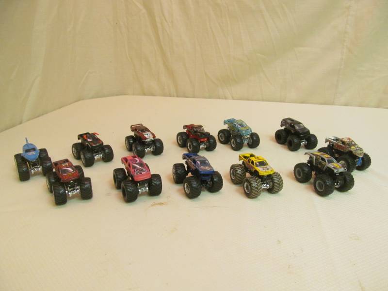 lot 129 image: (12) Hotwheels trucks
