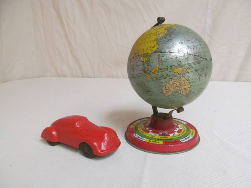 lot 114 image: vintage Tin Tot Globe, vintage steel care