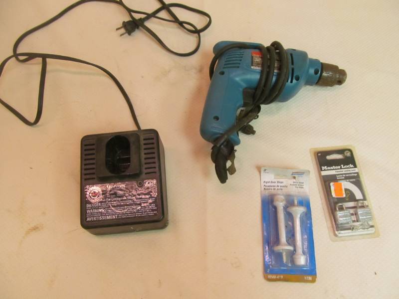 lot 167 image: Master Locks, Makita Drill
