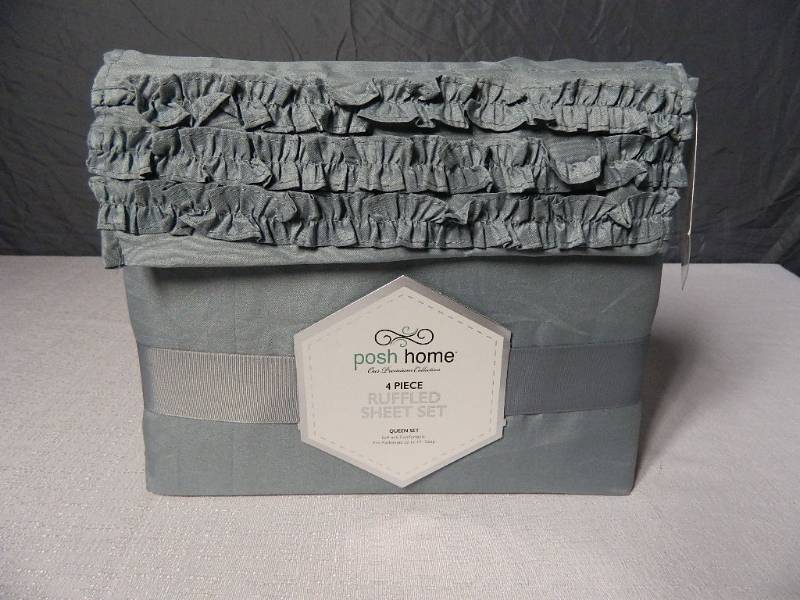 lot 38 image: New Posh Queen Sized Ruffle 4 Piece Sheet Set