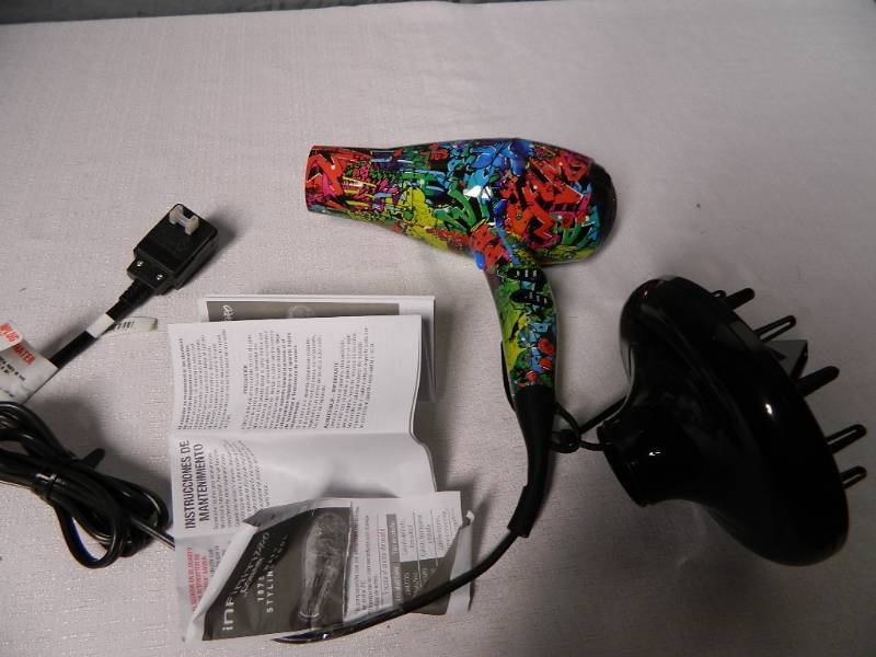 lot 49 image: New Limited Edition Conair Hairdryer with Attachments