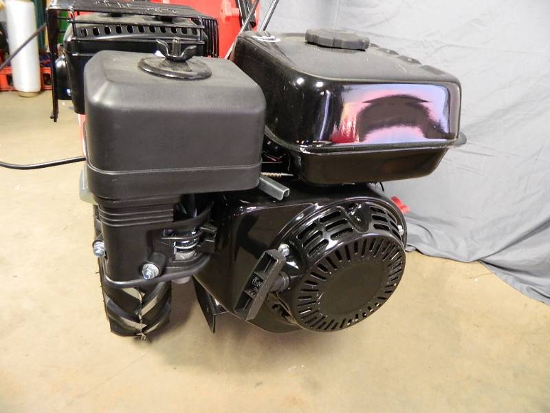 lot 12 image: New Rear Tine Garden Tiller