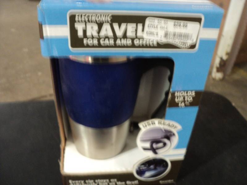 lot 24 image: Electronic Travel Mug...