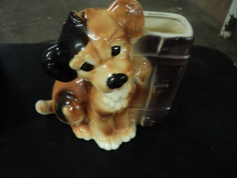 lot 32 image: Dog Planter...