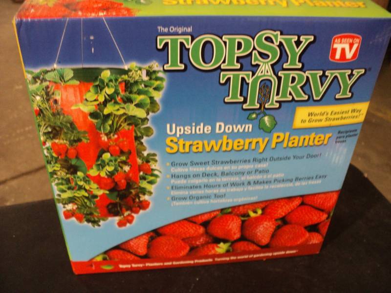 lot 42 image: Topsy Turxy Strawberry Planter...