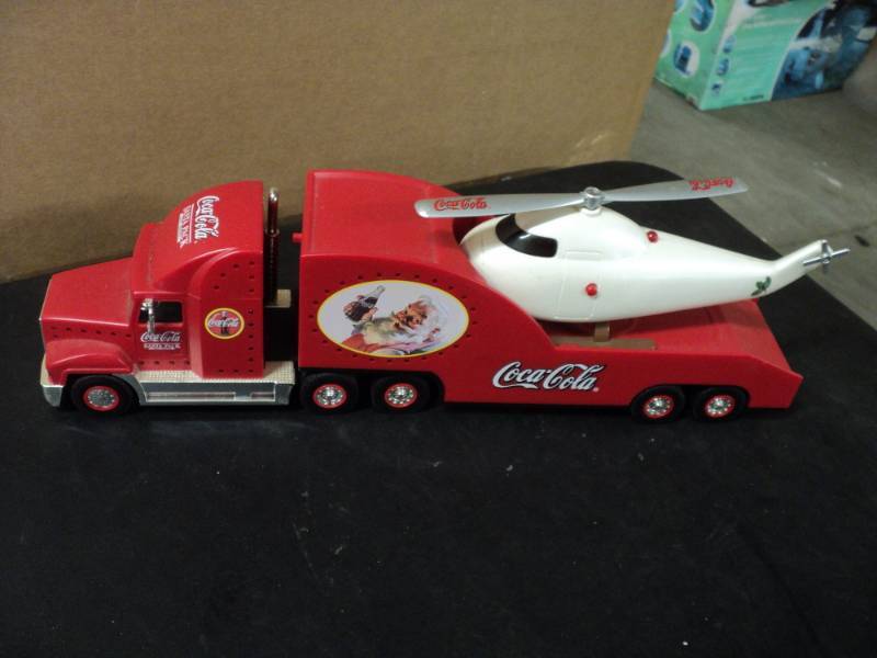 lot 142 image: Coca Cola Truck with Helicopter...
