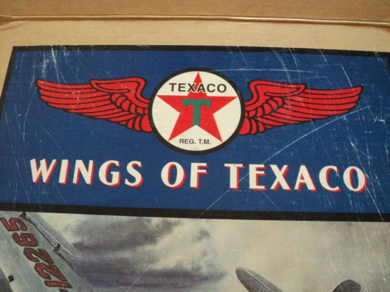 lot 182 image: Wings of Texaco Airplane Bark...