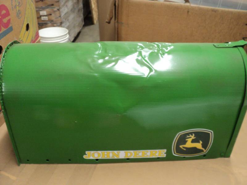 lot 223 image: John Deere Mailbox has dent on top...