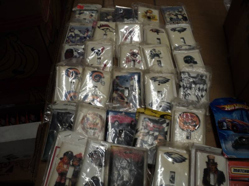 lot 273 image: 30 Light Switch Covers and Cars...