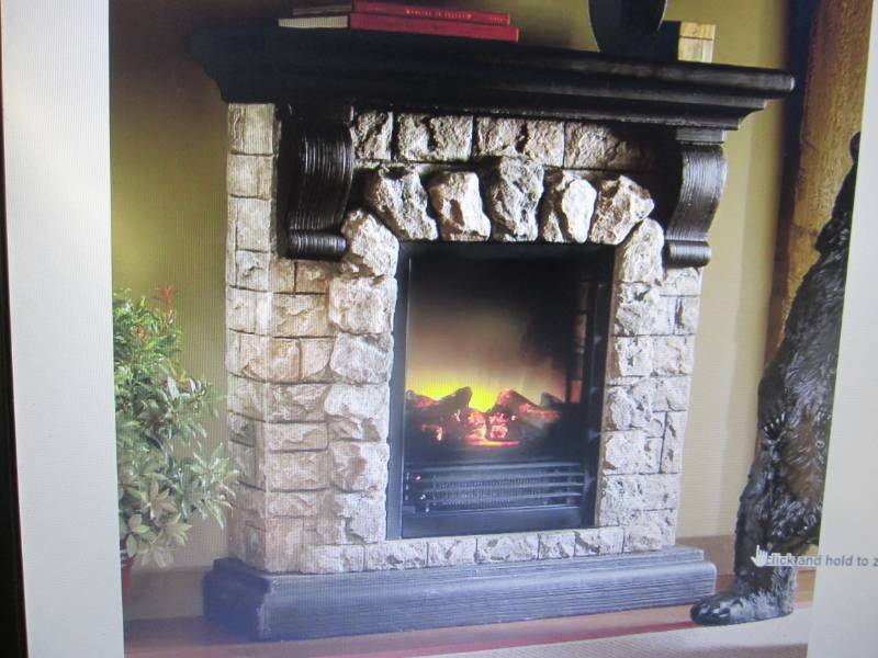 lot 214 image: Faux Stone Fireplace open box Retai...