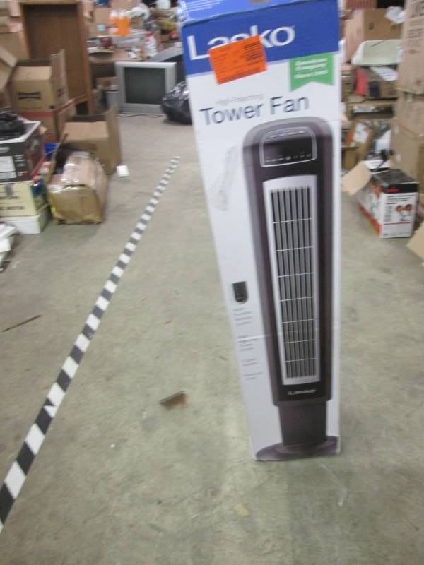 lot 299 image: Lasko 42 in. Tower Fan open box, te...