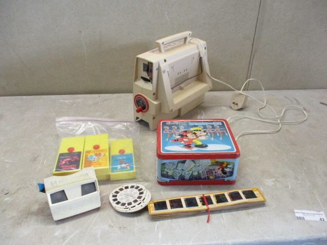 lot 42 image: Vintage Fisher Price and Disney Collectibles